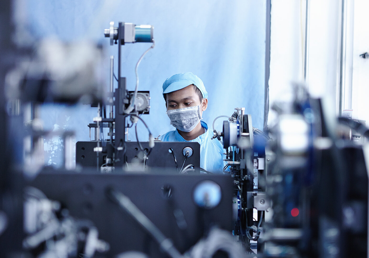 Worker at e-cigarettes battery factory, Guangdong, China